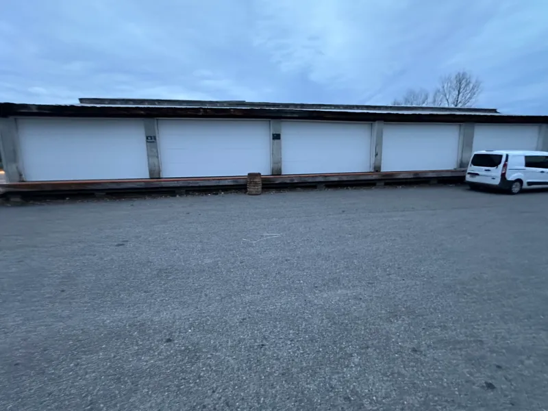 Commercial multi-bay overhead doors at a warehouse